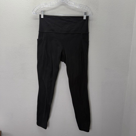 Athleta Pants - Athleta Salutation Stash Pocket II Tight Black Powervita Leggings Women's Medium
